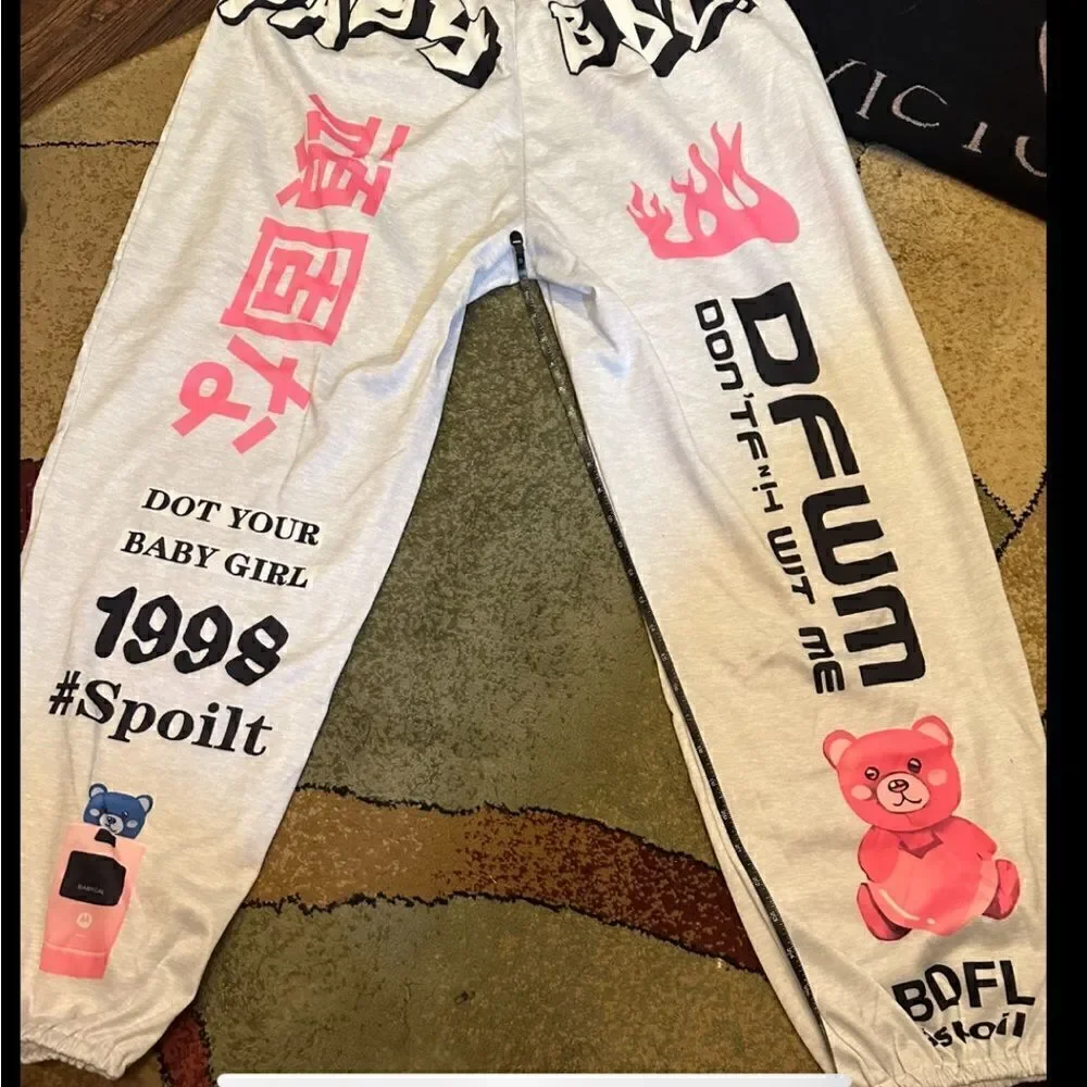 Y2K Printed joggers. Elastic at the ankle letter print with pockets. . Polyester